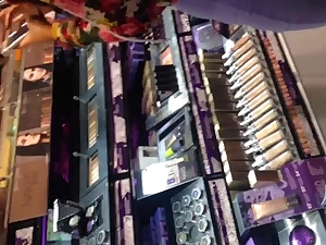 Sexy Asian in purple dress showing thong